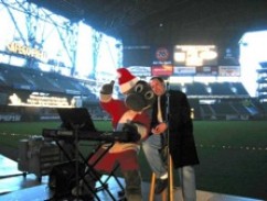 Steve Lawson hams it up with the Seattle Mariner Moose at Safeco field during a winter 2004 event. 