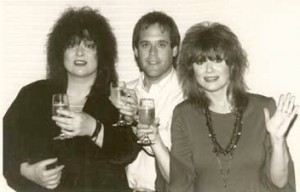Ann Wilson (left), Steve Lawson (middle), Nancy Wilson (right) celebrate the opening of Bad Animals/Seattle